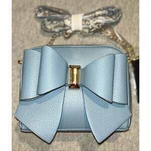 Crossi double bow blue purse